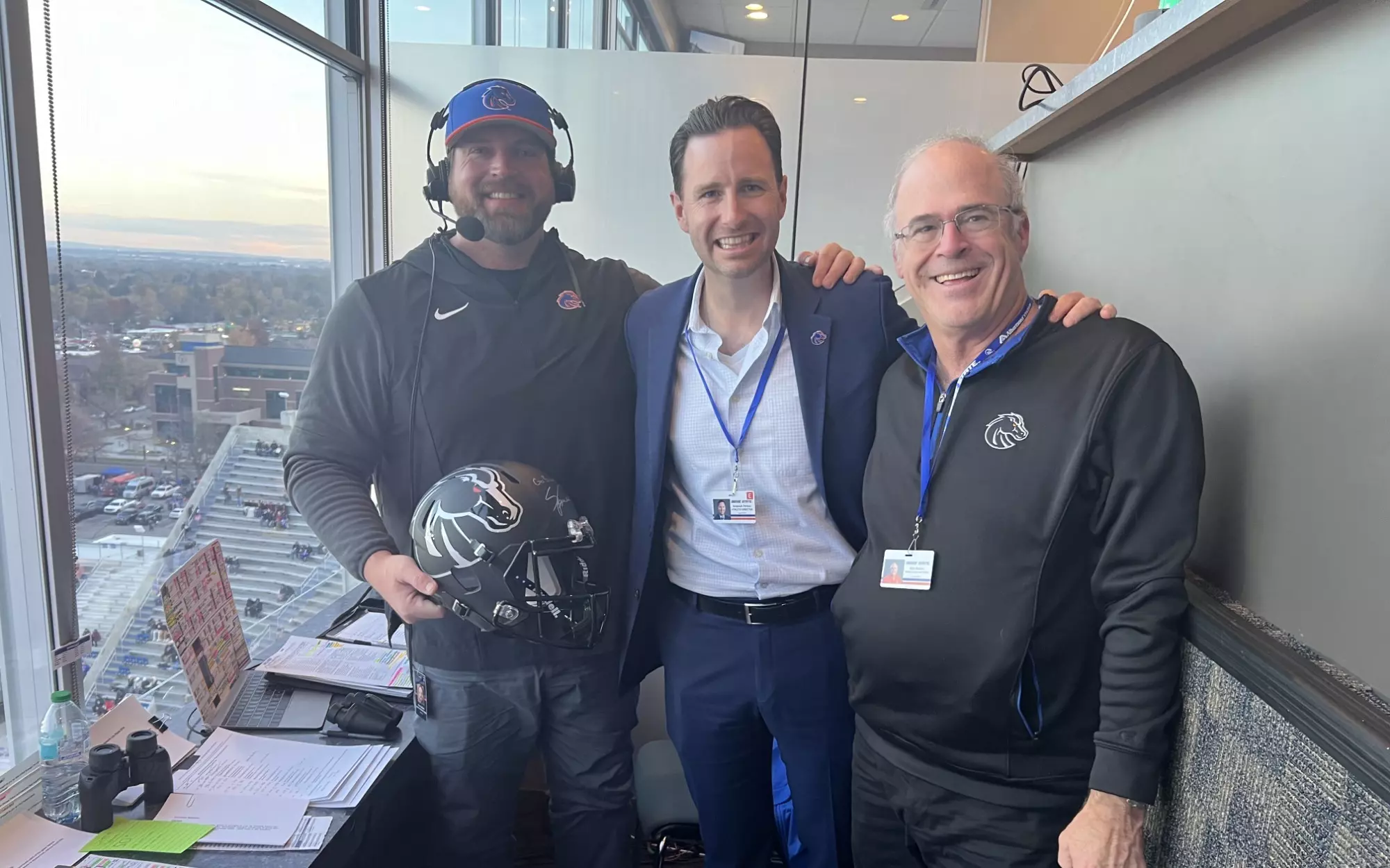 Boise State football broadcasters in the Albertsons Stadium broadcast booth