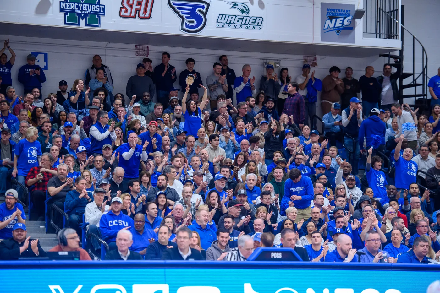 Central Connecticut basketball fans in the Detrick Gymnasium stands