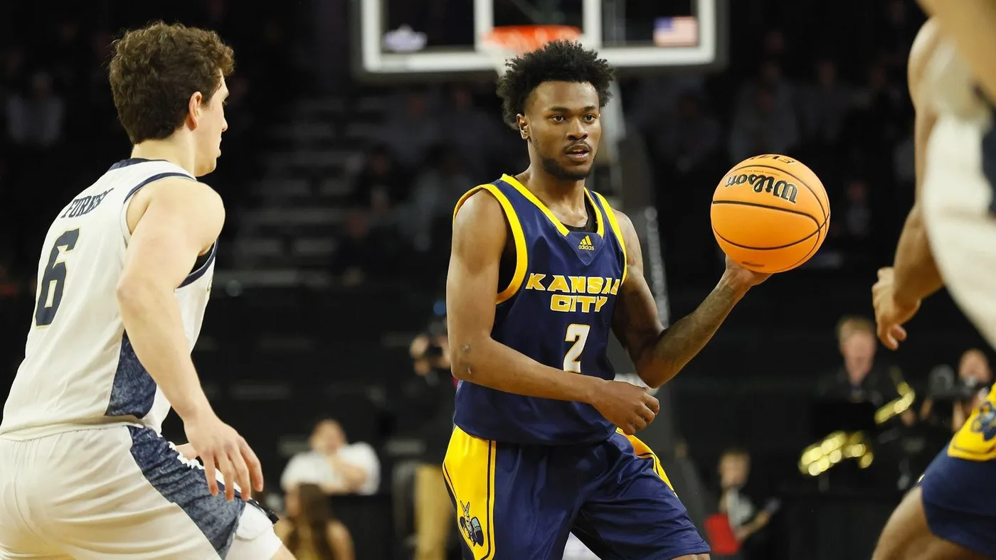 Kansas City guard CJ Evans looks to pass against Oral Roberts in the Summit League tournament