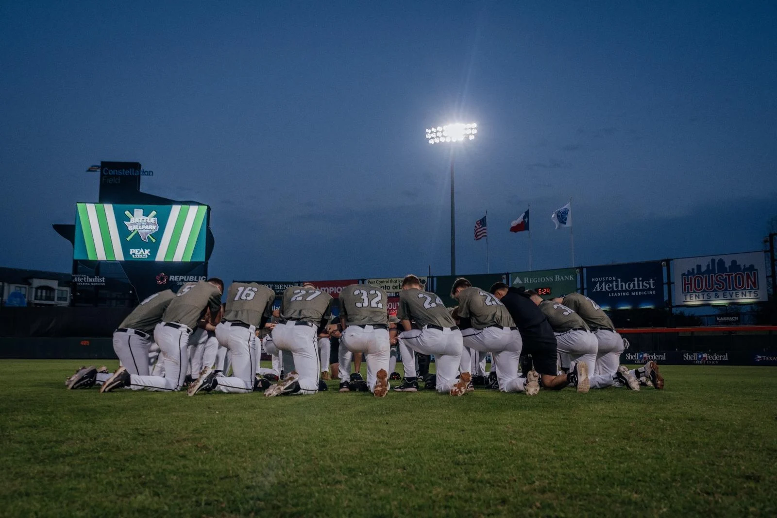 The Army baseball team huddles before facing Louisiana Tech in 2024 at the Peak Events Battle at the Ballpark. Army returns to the event in 2027, in San Antonio.