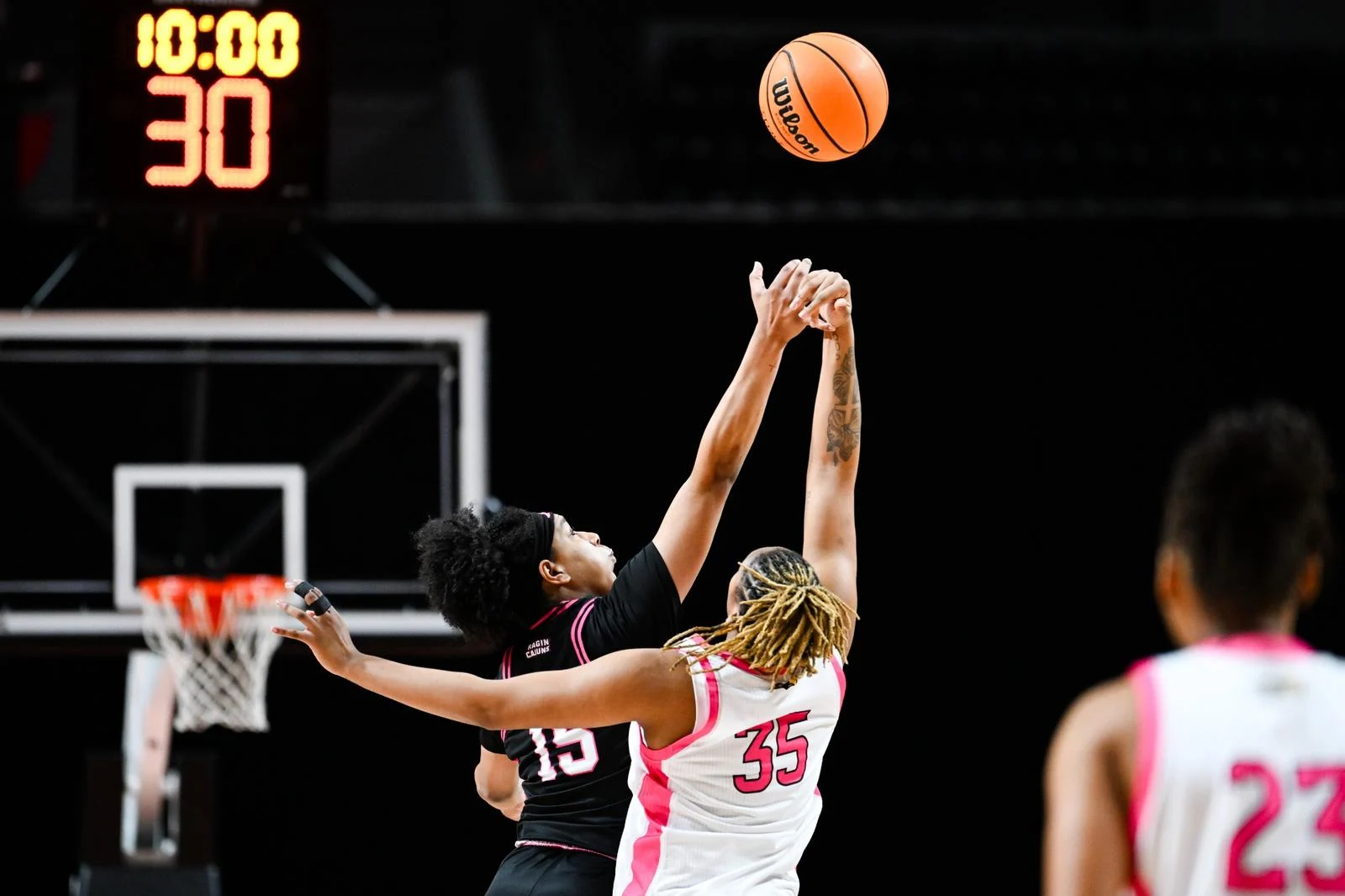 LAFAYETTE, LA - FEBRUARY 18: Imani Daniel #15 of the Ragin' Cajuns jump ball during Louisiana v Southern Miss Women's Basketball at the Cajundome on February 18, 2026 in Lafayette, Louisiana. (Photo by Benjamin R. Massey/Ragin’ Cajuns Athletics)