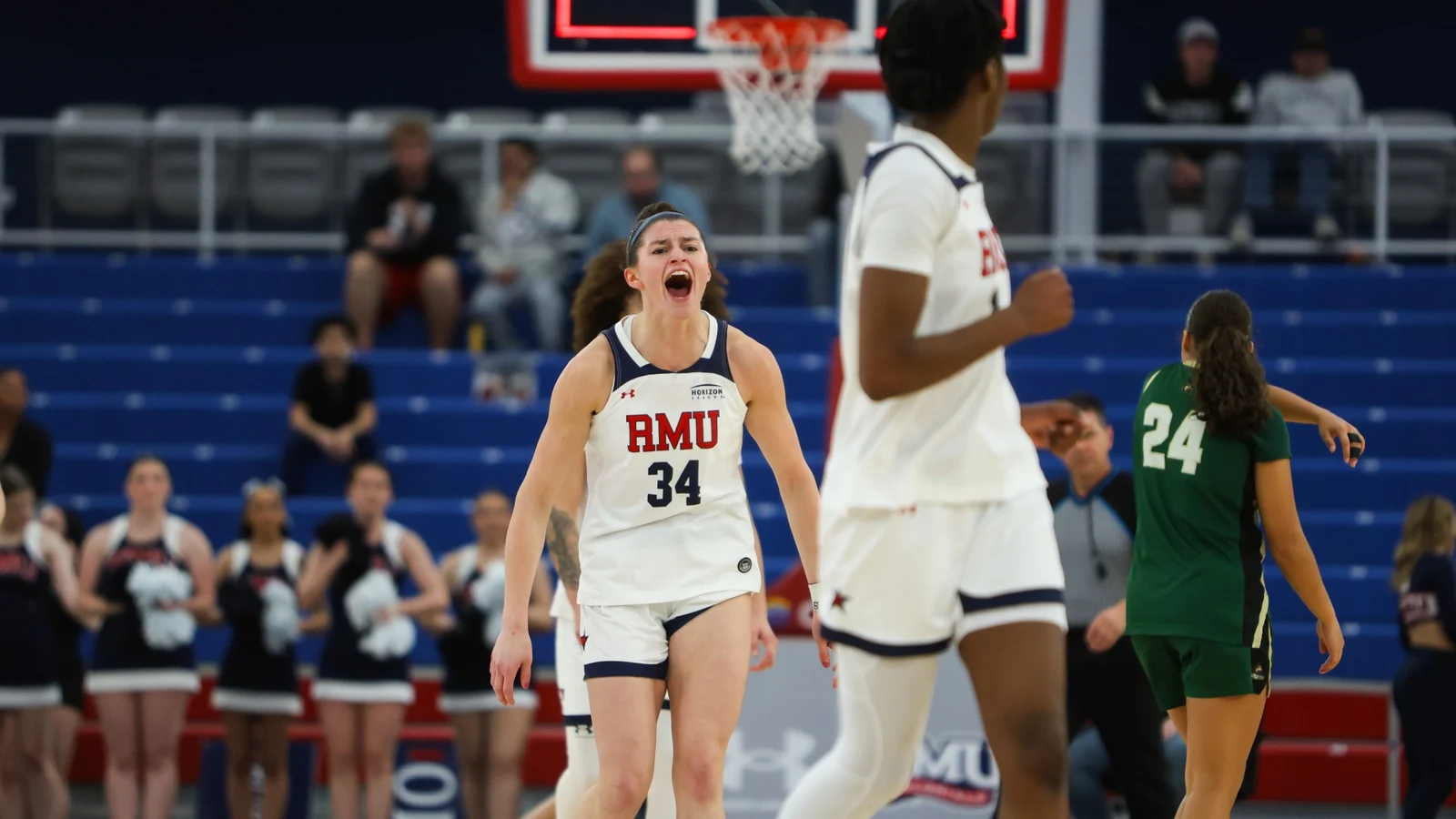 Robert Morris women’s basketball player Bailey Kuhns celebrates against Wright State