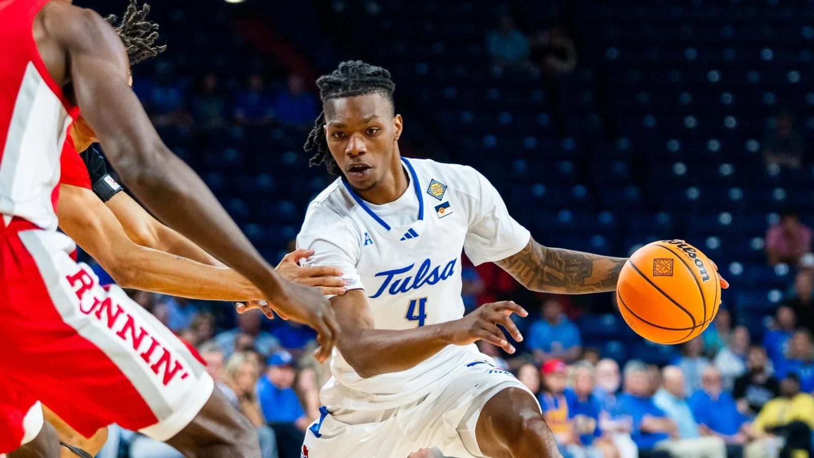 Myles Rigsby looks to drive against UNLV