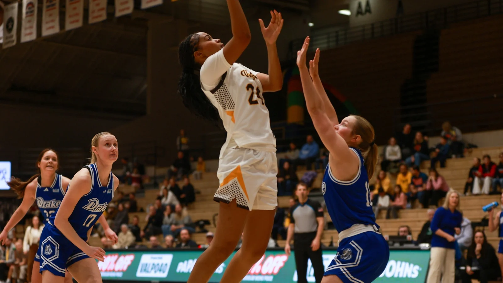 Valparaiso women's basketball player Kayla Preston shoots against Drake in a Beacons uniform