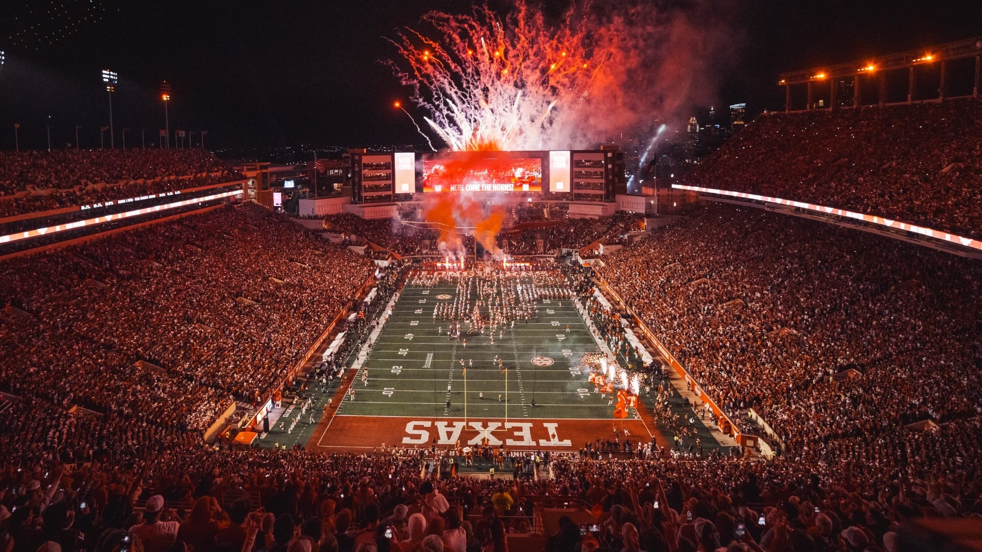 Fireworks above a packed DKR–Texas Memorial Stadium as the Longhorns take the field